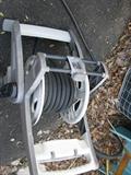 Hose and hose holder reel.