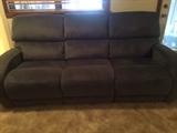 like new reclining sofa that matches the pair of electric recliners