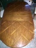 parquetry top dining table with two captain's chairs, 6 chairs total