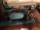 Deluxe turqouise sewing machine in cabinet
