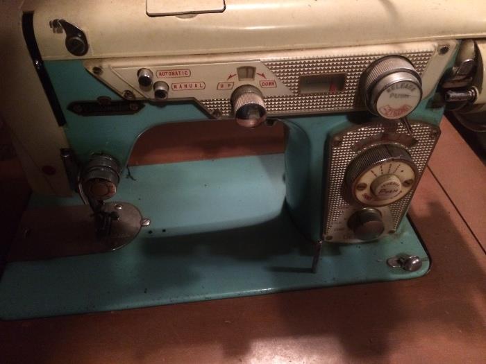 Deluxe turqouise sewing machine in cabinet