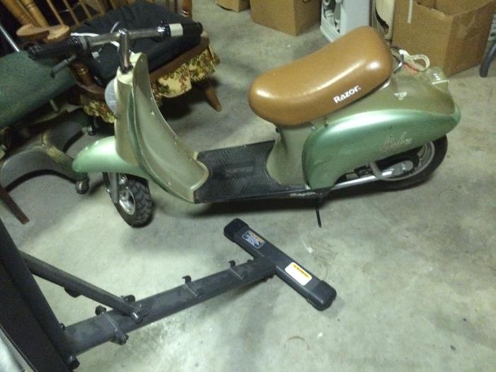 razor scooter...needs a battery...and a charger....a great fixer upper