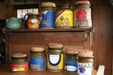 Anne White canisters with cork tops