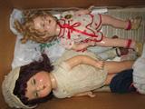 Shirley Temple doll with teeth and button.