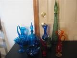 vintage glass pieces in turquoise, cobalt, red, green, and orange