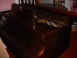 Another view of the Baby Grand piano