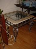 There is a set of 4 of this style table, 2 as shown, plus coffee table, and end table.