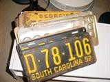 Large selection of old car license plates