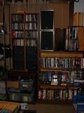 Some of the 100's of CD's and DVD's and stereo equipment and shelving