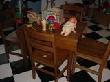 Childs table and chair set, with old Fisher Price toy wagon, dolls and more