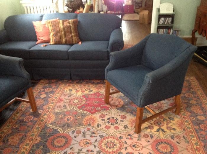 Navy sofa, 2 navy arm chairs, area rug