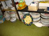 Seriously...what you see is really four or more stacks of plates - hand painted, commemorative, lace edged, haviland limoges, other makers...dinner plate size...lots of early stuff. We have bowls that the same way.