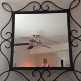 Iron framed mirror with matching lamps and candlesticks