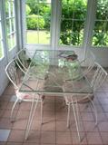Mid century glass table and set of 4 chairs...excellent condition-only used indoors
