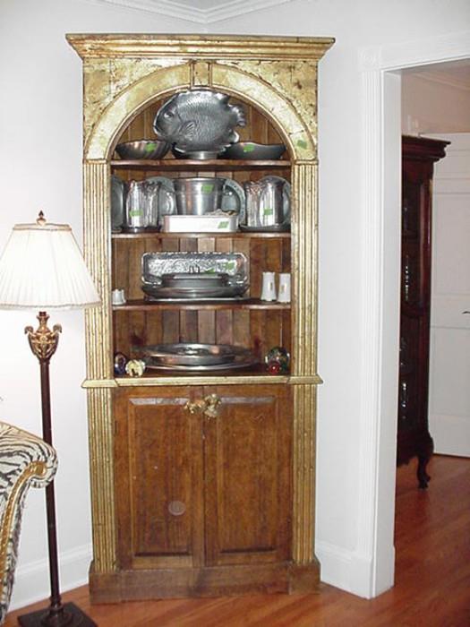 Gilded corner cabinet