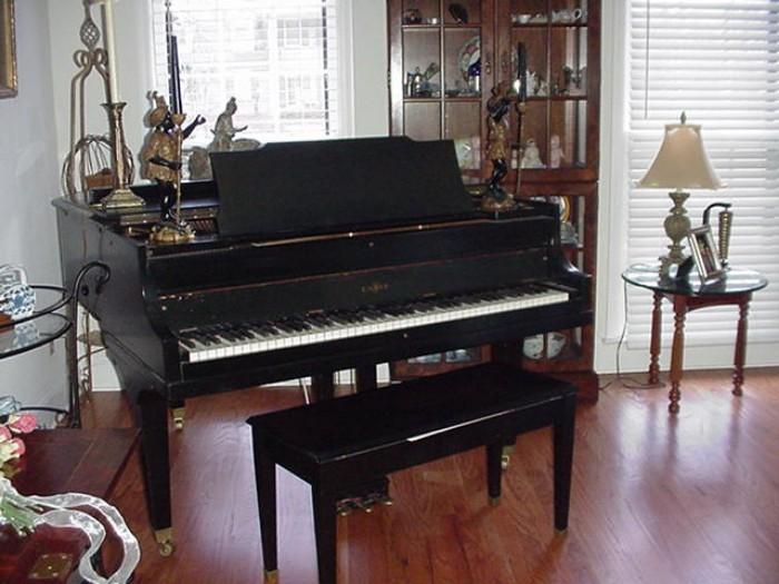 Ebony baby grand piano by Cable