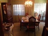 Dining room furniture.  Bernhardt dining room table with two leaves, pad, 6 chairs, china cabinet, folding bar.