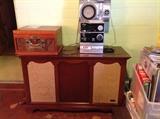 Zenith stereo/phono console.  Won't Powell up, but we will check to see if the fuse is blown. There are several boxes of records.  Big band, jazz, waltzes, movie sound tracks.  From the forties and newer.