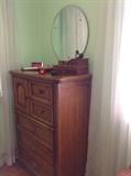 Chest of drawers with round mirror,