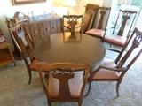 Dining table with 2 leaves and 6 chairs