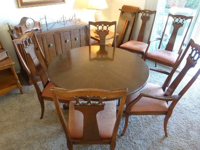 Dining table with 2 leaves and 6 chairs