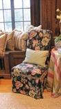 One of a pair of upholstered chairs. 