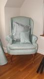 One of a pair of nicely upholstered wing chairs. 