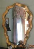 One of a pair of Gilt Decorated Mirrors. 