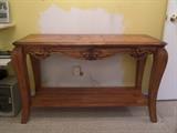 Ornate wooden table  Length 49.5", width 19", height 30"