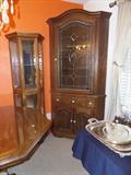 Wooden corner hutch with decorative glass:  7ft tall, 42" wide                                                                      Mirrored display cabinet: 70.5" tall, 24" wide, 11" deep