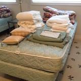 two twin beds with bedding