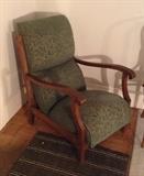 Low slung vintage chair with green mohair upholstery