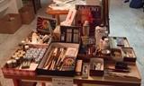 Art supplies including paints, brushes, colored pencils, ink pens, watercolors, etc.