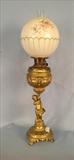 8  - Brass banquet lamp with cupid stenciling, still oil not electrified, 31 in. T