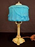10  - Small dresser lamp with satin glass blue shade and gold base, 15 in. T.