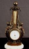 27  - Bronze barometer with porcelain dial, marble base and lady mounts, 14 in. T, 7 in. W, 4 in. D.