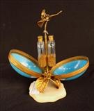 38  - Porcelain and bronze perfume bottle in egg shape with marble base, 9 in. T, 5 in. D.