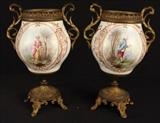39  - Matching pair of hand painted Sevres urns, 10 in. T, 6 in. W.