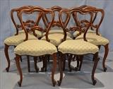 69  - Set of 8 rosewood dining chairs in excellent condition, ca. 1860, 34 in. T, 18 in. W, 16 in. D.