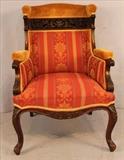 81  - Unusual mahogany fireside rococo arm chair with pierced carving and new upholstery.