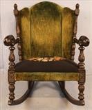 82  - Solid mahogany acanthus carved rocker with needlepoint seat and green upholstery, ca. 1860, 37 in. T. 28 in. W, 20 in. D.