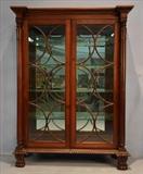 90  - Mahogany oversized empire china cabinet with column front, claw feet, individual glass doors, ca. 1840, 79 in. T, 53 in . W, 29 in. D.