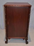 94  - Empire Revival music cabinet with acanthus carving and original interior, ca. 1880, 40 in. T, 23 in. W, 18 in. D.