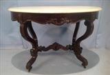 99  - Mahogany marble top center table, 30 in. T, 24 in. W, 28 in. D. has damage