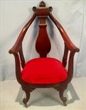 117  - Solid mahogany gothic style chair with carved flame torch crown, 46 in. T, 27 in. W, 20 in. D.