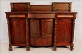 121  - Mahogany empire sideboard with acanthus carved columns and claw feet, ca. 1845, 52 in. T, 72 in. W, 25 in. D.