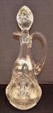 139  - Large intaglio cut glass decanter with stopper, 5 in. T.