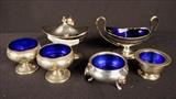 170  - 7 piece sterling set and cobalt blue condiment set by B and M Sterling.
