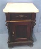 178  - Walnut Vict. marble top half commode w rounded corners, att. To Mitchell  and Rammelsberg, 31 in. T, 20 in. W, 18 in. D.