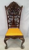 196  - Tall high back mahogany fireside chair, heavily carved with gold upholstery, att. To R.J. Horner, 53 in. T, 21 In. W, 18 in. D.